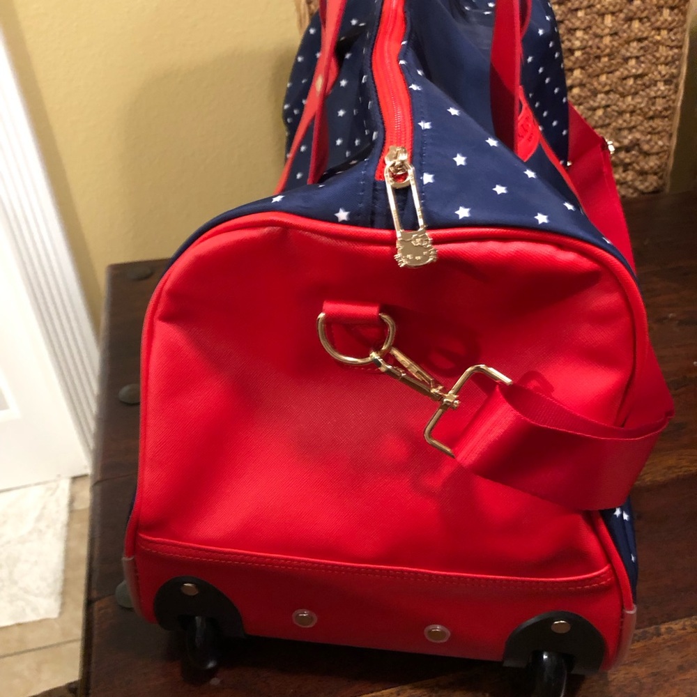 Hello Kitty & Friends Rolling Duffel Bag Navy Red Stars Carry On Luggage Wheels - Picture 9 of 13